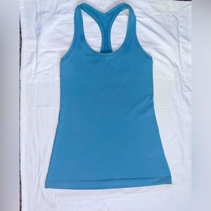 Lululemon size 4 or two cool race back tank top. No flaws light blue.